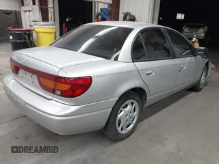 2002 Saturn SL with VIN 1G8ZK54762Z143727, listed as a IAAI auction lot 42441687 with 102,722 mi miles and . Bid and sale history available at DreamBid. Image 4.