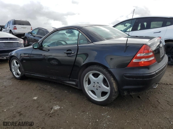 2002 Mercedes-Benz SLK-Class 3.2L with VIN WDBKK65F42F241268, listed as a Copart auction lot 45150305 with 164,998 mi miles and Salvage Title. Bid and sale history available at carsss.com. Image 2.