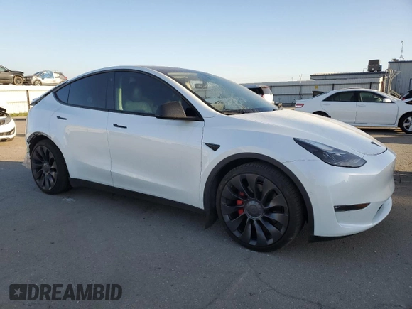 2022 Tesla Model Y Performance with VIN 7SAYGDEF0NF397241, listed as a Copart auction lot 46488005 with 37,422 mi miles and Salvage Title. Bid and sale history available at DreamBid. Image 4.
