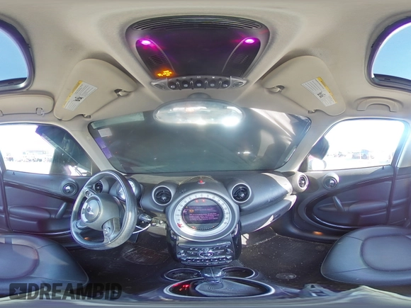 2012 MINI Countryman with VIN WMWZB3C58CWM03815, listed as a Copart auction lot 50097405 with 84,137 mi miles and Salvage Title. Bid and sale history available at DreamBid. Image 13.
