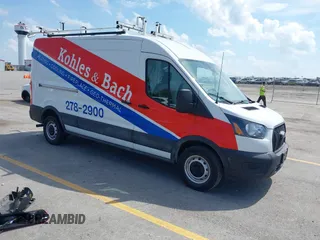 2023 Ford Transit Cargo with VIN 1FTBR1C80PKA43077, listed as a IAAI auction lot 40182475 with 15,656 mi miles and . Bid and sale history available at DreamBid. Image 1.