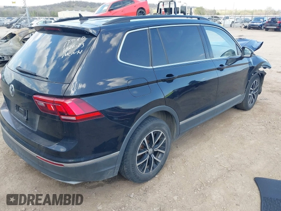 2021 Volkswagen Tiguan SE with VIN 3VV3B7AX3MM157702, listed as a IAAI auction lot 41888479 with 51,807 mi miles and . Bid and sale history available at DreamBid. Image 4.