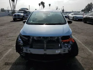 2023 Chevrolet Bolt EV 2LT with VIN 1G1FX6S04P4122510, listed as a Copart auction lot 60584705 with 12,291 mi miles and Salvage title. Bid and sale history available at DreamBid. Image 5.