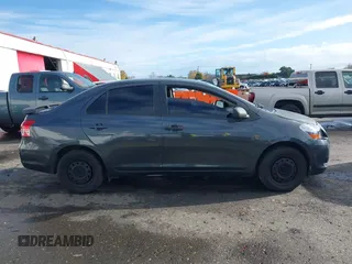 2010 Toyota Yaris with VIN JTDBT4K37A4068398, listed as a IAAI auction lot 40915313 with 123,222 mi miles. Bid and sale history available at carsss.com. Image 12.