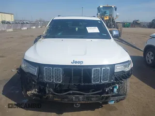 2015 Jeep Grand Cherokee Summit with VIN 1C4RJFJGXFC734025, listed as a IAAI auction lot 41842927 with 137,993 mi miles. Bid and sale history available at carsss.com. Image 12.