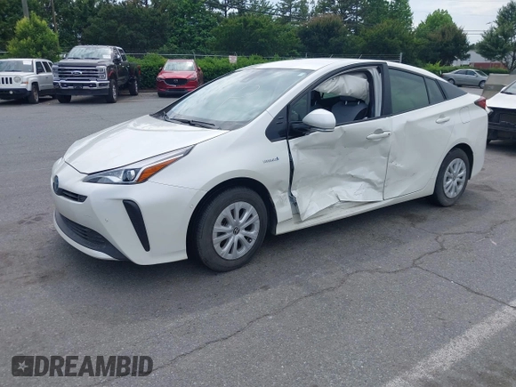 2019 Toyota Prius L Eco z VIN JTDKARFU3K3102222, wystawiony jako IAAI lot #42291403 z przebiegiem 27 669 mil mil oraz . Historia ofert i sprzedaży dostępna na DreamBid. Obrazek 2.