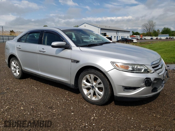 2011 Ford Taurus SEL z VIN 1FAHP2EW3BG119538, wystawiony jako Copart lot #54734985 z przebiegiem 53 753 mil mil oraz Szkoda całkowita • Salvage title. Historia ofert i sprzedaży dostępna na DreamBid. Obrazek 4.