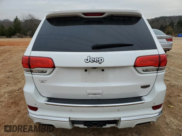 2015 Jeep Grand Cherokee Summit with VIN 1C4RJEJG8FC118673, listed as a Copart auction lot 84052044 with 182,806 mi miles and Salvage title. Bid and sale history available at DreamBid. Image 6.
