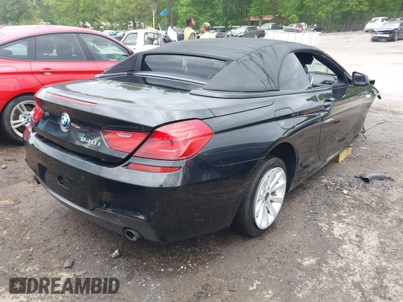 2014 BMW 6 Series 640i z VIN WBALW7C5XED595934, wystawiony jako IAAI lot #42092380 z przebiegiem Nie podano mil oraz . Historia ofert i sprzedaży dostępna na DreamBid. Obrazek 4.