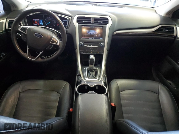 2015 Ford Fusion SE z VIN 3FA6P0H98FR295646, wystawiony jako Copart lot #57055105 z przebiegiem 121 515 mil mil oraz Szkoda całkowita • Salvage title. Historia ofert i sprzedaży dostępna na DreamBid. Obrazek 8.