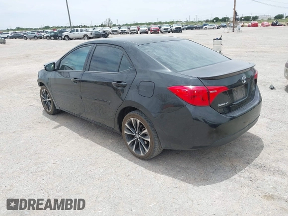2017 Toyota Corolla L with VIN 2T1BURHE4HC843864, listed as a IAAI auction lot 42274808 with 106,371 mi miles and . Bid and sale history available at DreamBid. Image 3.