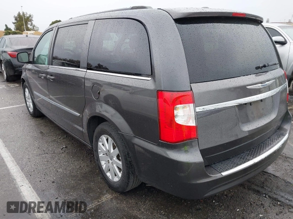 2015 Chrysler Town & Country Touring with VIN 2C4RC1BG9FR720782, listed as a IAAI auction lot 41765488 with 129,889 mi miles and . Bid and sale history available at DreamBid. Image 3.