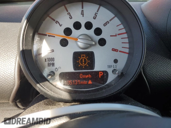 2014 MINI Countryman with VIN WMWZB3C5XEWR42035, listed as a Copart auction lot 61846725 with 105,131 mi miles and Salvage title. Bid and sale history available at DreamBid. Image 9.
