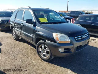 2007 Kia Sportage LX with VIN KNDJE723477340629, listed as a IAAI auction lot 41058566 with 134,884 mi miles. Bid and sale history available at carsss.com. Image 1.