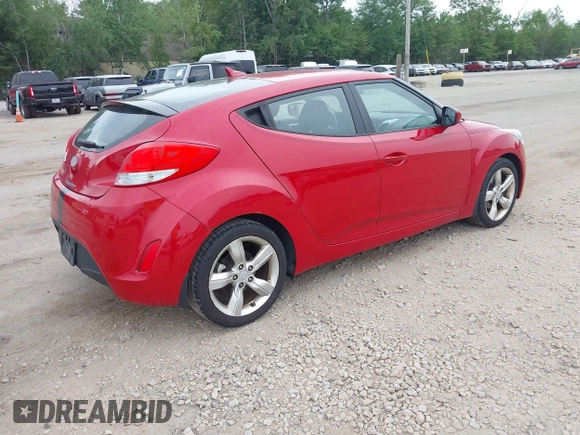 2013 Hyundai Veloster w/Gray Int with VIN KMHTC6AD0DU145090, listed as a IAAI auction lot 42618390 with 126,641 mi miles and . Bid and sale history available at DreamBid. Image 4.