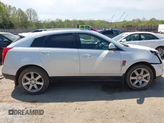 2012 Cadillac SRX Performance Collection z VIN 3GYFNBE39CS628740, wystawiony jako IAAI lot #42063414 z przebiegiem 88 260 mil mil oraz . Historia ofert i sprzedaży dostępna na DreamBid. Obrazek 13.