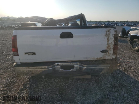 2000 Ford F-150 XL with VIN 1FTZF1727YKB49797, listed as a Copart auction lot 62154595 with Not provided miles and Salvage title. Bid and sale history available at DreamBid. Image 6.