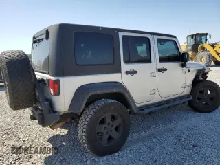 2010 Jeep Wrangler Unlimited Rubicon with VIN 1J4BA6H12AL107485, listed as a Copart auction lot 48802825 with 123,299 mi miles and Salvage title. Bid and sale history available at DreamBid. Image 3.