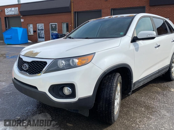 2012 Kia Sorento LX with VIN 5XYKT3A13CG306729, listed as a Copart auction lot 48946605 with 183,878 mi miles and Clean Title. Bid and sale history available at DreamBid. Image 2.