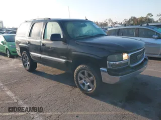 2005 GMC Yukon SLE with VIN 1GKEC13V15R105390, listed as a IAAI auction lot 42076410 with 237,160 mi miles. Bid and sale history available at carsss.com. Image 1.