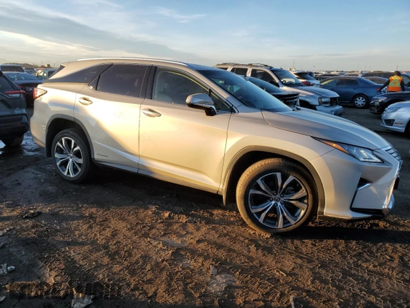 2019 Lexus RX with VIN JTJDGKCA0K2007127, listed as a Copart auction lot 79649794 with 58,693 mi miles and Salvage Title. Bid and sale history available at carsss.com. Image 4.
