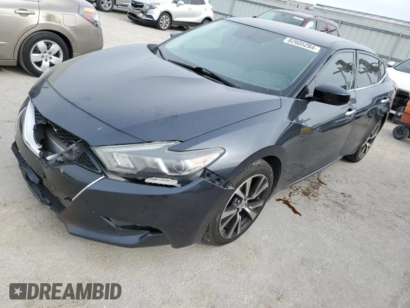 2016 Nissan Maxima S with VIN 1N4AA6AP2GC412340, listed as a Copart auction lot 82605284 with 127,262 mi miles and Salvage Title. Bid and sale history available at DreamBid. Image 1.