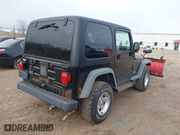 2006 Jeep Wrangler Sport with VIN 1J4FA49S66P746787, listed as a IAAI auction lot 41537730 with 97,365 mi miles. Bid and sale history available at carsss.com. Image 4.