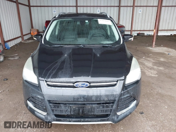 2014 Ford Escape Titanium z VIN 1FMCU0J96EUA84108, wystawiony jako IAAI lot #42114002 z przebiegiem 176 735 mil mil oraz . Historia ofert i sprzedaży dostępna na DreamBid. Obrazek 12.