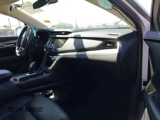 2017 Cadillac XT5 Luxury AWD z VIN 1GYKNDRS1HZ293429, wystawiony jako IAAI lot #42453704 z przebiegiem 92 347 mil mil oraz . Historia ofert i sprzedaży dostępna na DreamBid. Obrazek 5.