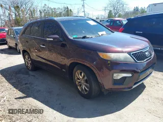2011 Kia Sorento SX with VIN 5XYKWDA28BG122133, listed as a IAAI auction lot 41973379 with 185,627 mi miles. Bid and sale history available at carsss.com. Image 1.