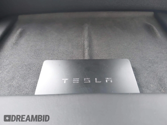 2021 Tesla Model 3 Performance with VIN 5YJ3E1EC5MF919278, listed as a IAAI auction lot 40194677 with 50,484 mi miles and . Bid and sale history available at carsss.com. Image 11.