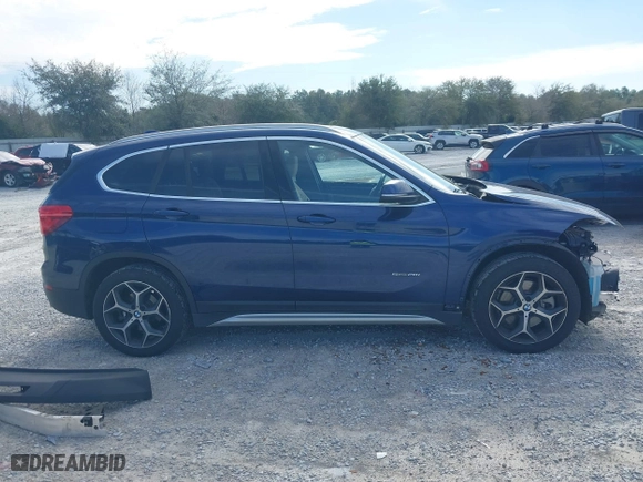 2018 BMW X1 sDrive28i with VIN WBXHU7C34J5H44572, listed as a IAAI auction lot 41607151 with 43,056 mi miles. Bid and sale history available at carsss.com. Image 14.