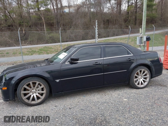 2006 Chrysler 300 C SRT8 with VIN 2C3KA73W06H239927, listed as a IAAI auction lot 41837066 with 169,260 mi miles. Bid and sale history available at carsss.com. Image 14.