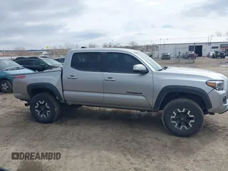 2023 Toyota Tacoma 4WD SR with VIN 3TMCZ5AN0PM609672, listed as a IAAI auction lot 41830191 with 24,244 mi miles. Bid and sale history available at carsss.com. Image 13.