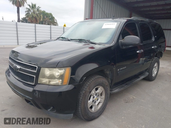 2007 Chevrolet Tahoe LS z VIN 1GNFC13C37J395803, wystawiony jako IAAI lot #42068163 z przebiegiem 273 156 mil mil oraz . Historia ofert i sprzedaży dostępna na DreamBid. Obrazek 2.