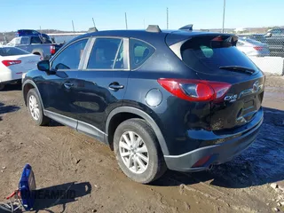 2016 Mazda CX-5 Sport with VIN JM3KE4BY0G0662294, listed as a IAAI auction lot 41469721 with 127,116 mi miles and . Bid and sale history available at carsss.com. Image 3.