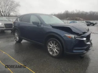 2019 Mazda CX-5 Grand Touring with VIN JM3KFBDM1K0676645, listed as a Copart auction lot 47938715 with 62,106 mi miles and Salvage Title. Bid and sale history available at carsss.com. Image 4.