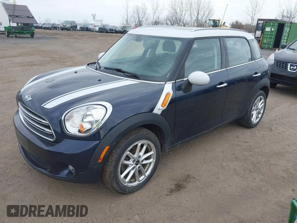 2015 MINI Countryman z VIN WMWZB3C56FWR44706, wystawiony jako IAAI lot #41921628 z przebiegiem 128 530 mil mil oraz . Historia ofert i sprzedaży dostępna na DreamBid. Obrazek 2.