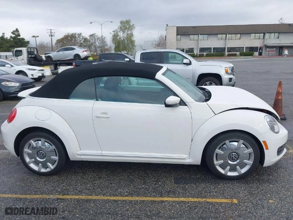 2013 Volkswagen Beetle Convertible 2.5L with VIN 3VW5P7AT9DM825439, listed as a IAAI auction lot 41760907 with 53,649 mi miles. Bid and sale history available at carsss.com. Image 13.