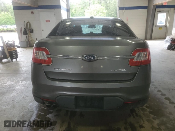 2012 Ford Taurus Limited with VIN 1FAHP2FW3CG113920, listed as a Copart auction lot 55565615 with 131,981 mi miles and Salvage title. Bid and sale history available at DreamBid. Image 6.