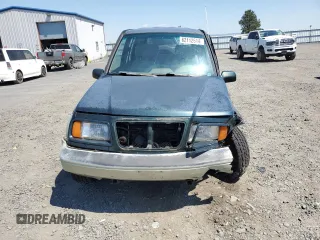 1998 Suzuki Sidekick z VIN JS3TD21V9W4103914, wystawiony jako Copart lot #62112514 z przebiegiem 394 872 mil mil oraz Szkody całkowita. Historia ofert i sprzedaży dostępna na DreamBid. Obrazek 5.