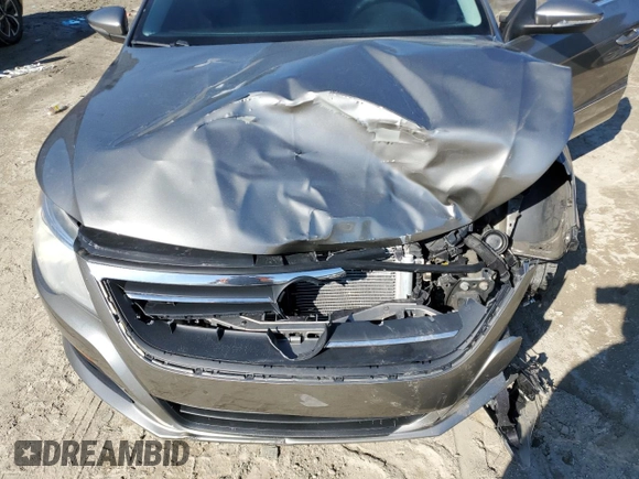 2011 Volkswagen CC Sport z VIN WVWMP7AN6BE711109, wystawiony jako Copart lot #46986105 z przebiegiem 198 582 mil mil oraz Szkoda całkowita • Salvage title. Historia ofert i sprzedaży dostępna na DreamBid. Obrazek 11.