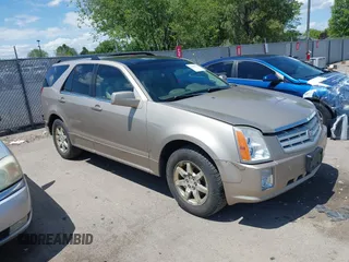 2006 Cadillac SRX z VIN 1GYEE637X60160053, wystawiony jako IAAI lot #42289771 z przebiegiem 140 970 mil mil oraz . Historia ofert i sprzedaży dostępna na DreamBid. Obrazek 1.