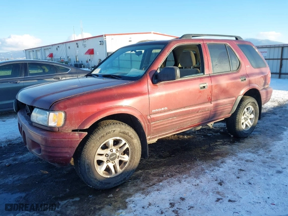 2002 Isuzu Rodeo with VIN 4S2DM58W124319936, listed as a IAAI auction lot 41555285 with 143,035 mi miles. Bid and sale history available at carsss.com. Image 17.