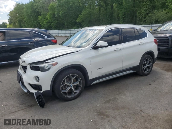 2018 BMW X1 xDrive28i with VIN WBXHT3C35J5F90062, listed as a Copart auction lot 56284945 with 138,137 mi miles and Salvage title. Bid and sale history available at DreamBid. Image 1.