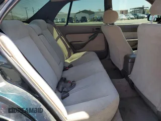 1995 Toyota Camry LE with VIN JT2GK12EXS0123355, listed as a Copart auction lot 53195364 with 171,510 mi miles and Salvage Title. Bid and sale history available at carsss.com. Image 10.