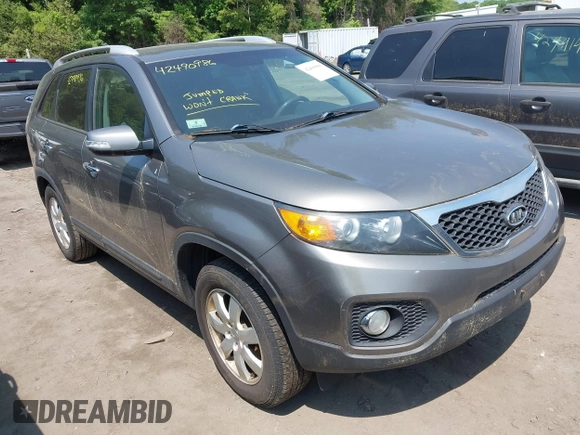 2013 Kia Sorento LX with VIN 5XYKT3A64DG363258, listed as a IAAI auction lot 42490986 with 215,694 mi miles and . Bid and sale history available at DreamBid. Image 1.