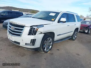 2018 Cadillac Escalade Luxury with VIN 1GYS3BKJ7JR140183, listed as a IAAI auction lot 40769705 with 106,774 mi miles. Bid and sale history available at carsss.com. Image 2.