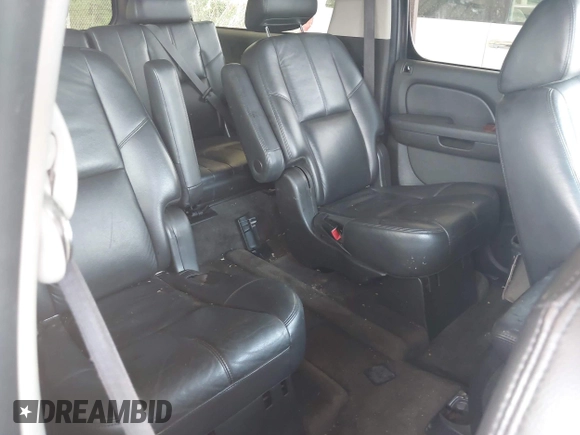 2008 Chevrolet Suburban LTZ with VIN 1GNFK16328R161721, listed as a IAAI auction lot 42130017 with 242,266 mi miles. Bid and sale history available at carsss.com. Image 8.