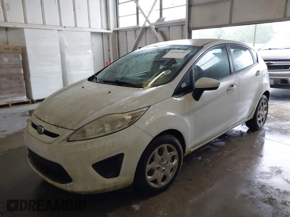 2013 Ford Fiesta S z VIN 3FADP4TJ2DM215185, wystawiony jako IAAI lot #42365480 z przebiegiem 193 072 mil mil oraz . Historia ofert i sprzedaży dostępna na DreamBid. Obrazek 6.
